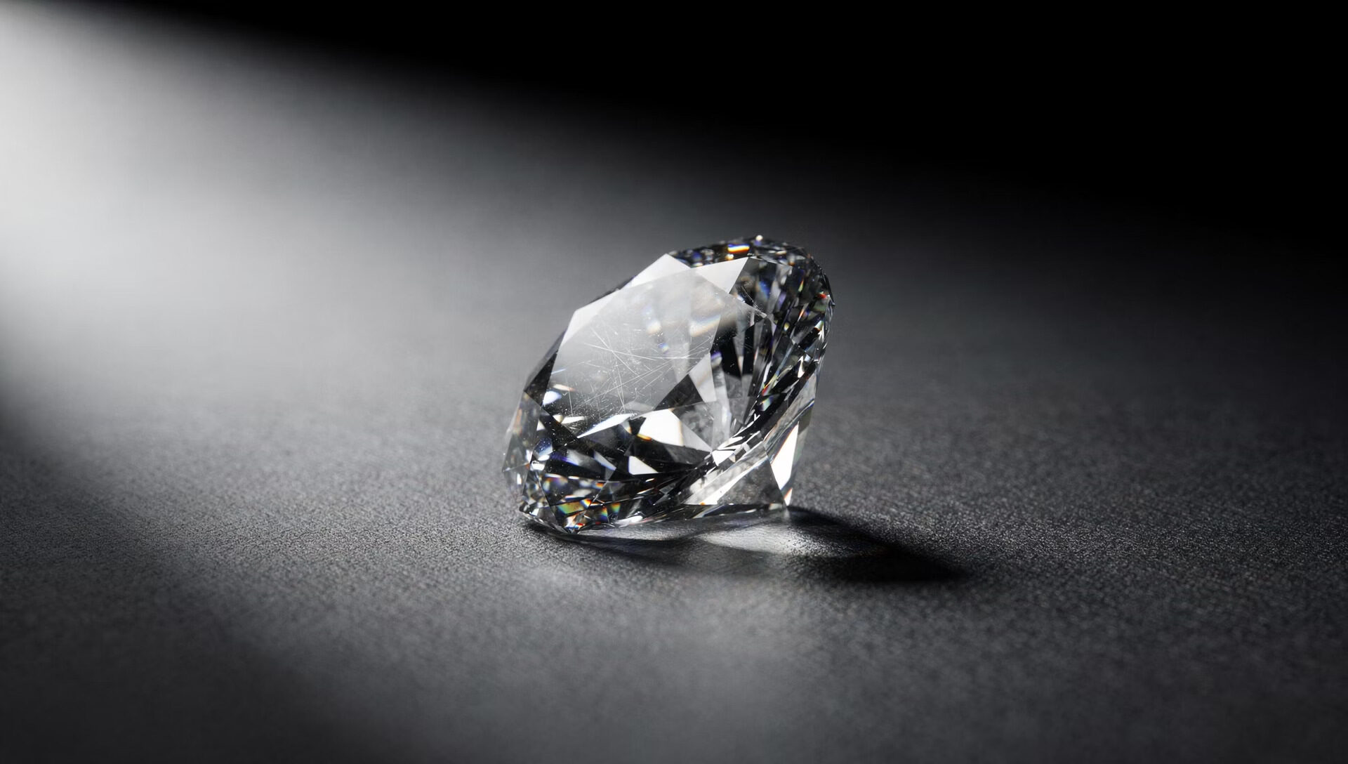 A diamond under focused light, symbolizing an asset made clear enough to underwrite.
